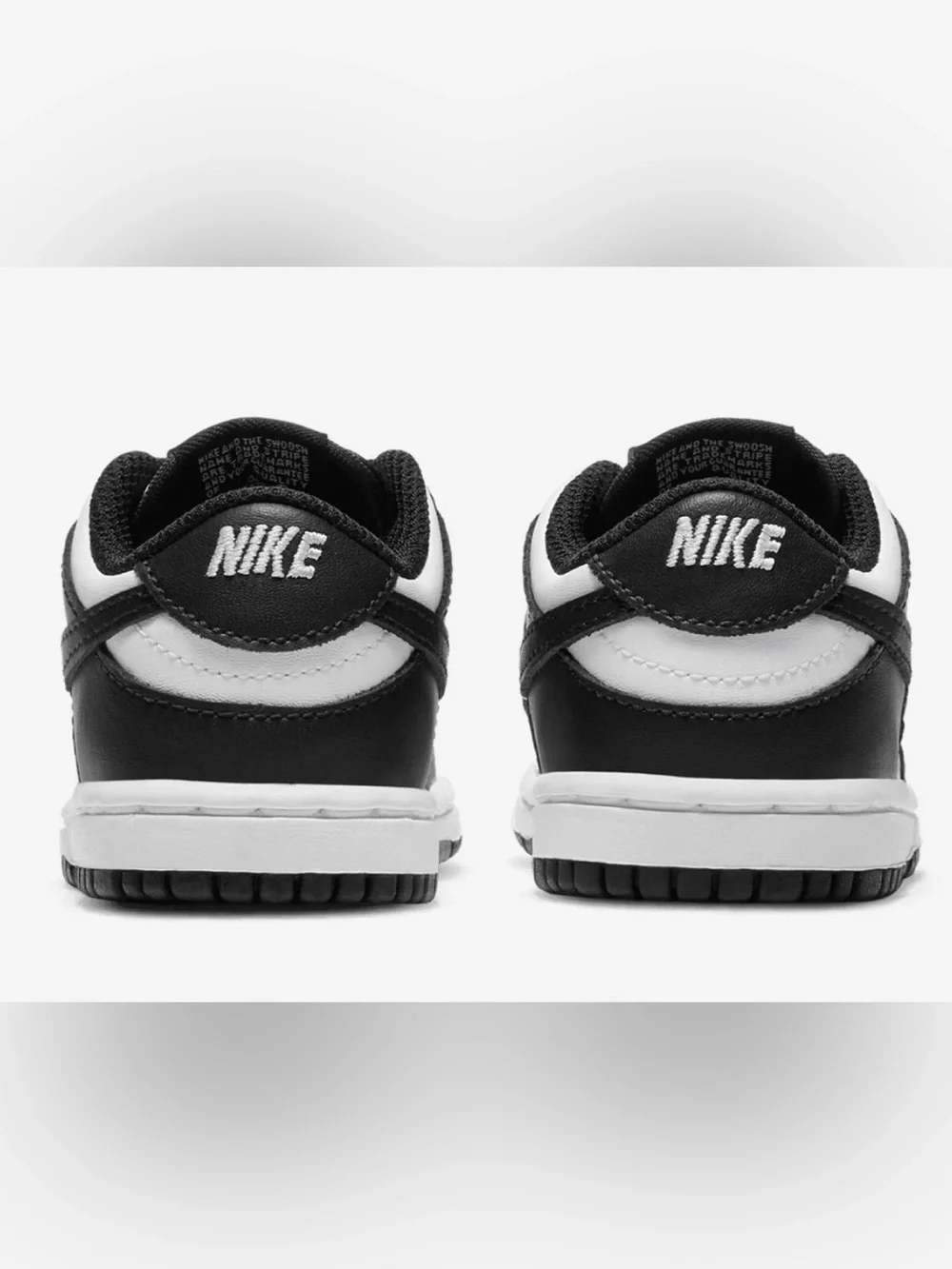 Nike Kids Black and White Low-Top Sneaker with Swoosh